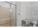 Well lit bathroom featuring a glass enclosed shower and neutral color palette at 3137 Sun Lake Ct # B, Kissimmee, FL 34747