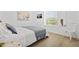 Bright bedroom with natural light, laminate floors and a comfortable bed at 3137 Sun Lake Ct # B, Kissimmee, FL 34747