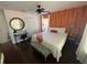 Cozy bedroom featuring a plush bed, ceiling fan, desk, and ample closet space at 375 Orange Cosmos Blvd, Davenport, FL 33837