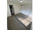 Spacious bedroom features new flooring and double closets to maximize storage at 4200 Thornbriar Ln # 208, Orlando, FL 32822