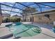 Inviting screened-in pool and patio area, perfect for relaxing and entertaining outdoors at 4815 Doc Dr, St Cloud, FL 34771