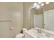 Bathroom featuring single vanity and a walk-in shower at 500 Viceroy Ct, Kissimmee, FL 34758