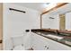 Bathroom with granite counters, modern fixtures and toilet in separate area at 5311 Burning Tree Dr # D, Orlando, FL 32811