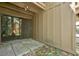 Enclosed back patio perfect for outdoor relaxation and entertaining with easy yard access at 5311 Burning Tree Dr # D, Orlando, FL 32811