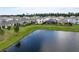 Beautiful home with pool and backyard overlooking a pond in a Gathering-friendly community at 6808 Cranes Roost Rd, Harmony, FL 34773