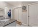This bathroom features granite countertops, neutral wall colors, and a decorative hook and art piece at 6808 Cranes Roost Rd, Harmony, FL 34773
