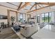 Comfortable resident lounge featuring high ceilings, elegant lighting, and modern decor at 6808 Cranes Roost Rd, Harmony, FL 34773