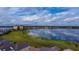 Sand Lake Sound aerial view with a beautiful lake in the background at 7381 Alpine Butterfly Ln, Orlando, FL 32819