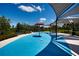 Vibrant splash pad area with shade structures and colorful water features surrounded by green landscaping at 7381 Alpine Butterfly Ln, Orlando, FL 32819