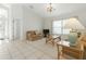 Living room featuring neutral decor, tile flooring and bright natural light at 8595 Sunrise Key Dr, Kissimmee, FL 34747
