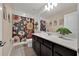 Bathroom featuring a flower-patterned shower curtain and a double sink vanity at 1562 Delightful Dr, Davenport, FL 33896