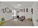 bedroom with carpet flooring, a small bed, and decorated walls at 1562 Delightful Dr, Davenport, FL 33896