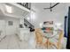 Open floorplan showcasing the kitchen, dining area, and living room with a staircase to the loft at 8708 Papaya Dr, Kissimmee, FL 34747
