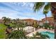 Aerial view showcasing the community's splash pad, pool, and well-maintained landscaping at 1007 Park Ridge Cir, Kissimmee, FL 34746