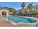 Sparkling community pool with lounge chairs, offering a relaxing outdoor experience at 1007 Park Ridge Cir, Kissimmee, FL 34746