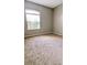 Bedroom features carpet flooring, neutral walls, and a window at 12634 Ringwood Ave, Orlando, FL 32837