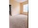 Bedroom features carpet flooring, neutral walls, and a window at 12634 Ringwood Ave, Orlando, FL 32837