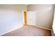 Bedroom featuring carpet, a closet, and a window at 12634 Ringwood Ave, Orlando, FL 32837