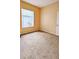 Bedroom features carpet flooring, neutral walls, and a window at 12634 Ringwood Ave, Orlando, FL 32837