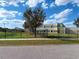 Well-maintained school building with landscaping and a secure fenced perimeter at 12634 Ringwood Ave, Orlando, FL 32837