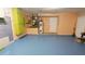 Spacious garage with a painted floor and a utility sink at 12634 Ringwood Ave, Orlando, FL 32837