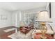 Comfortable living room with a bright window and traditional-style furnishings at 13258 Vennetta Way, Windermere, FL 34786