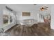 Comfortable living room with a ceiling fan, light-colored walls, and wood-look flooring at 145 Kensington Park Dr, Davenport, FL 33897