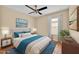 Cozy bedroom featuring a comfortable bed, bedside tables, and ample natural light creating a relaxing and inviting atmosphere at 1518 Orrington Payne Pl, Casselberry, FL 32707