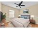 Comfortable bedroom with a cozy bed, stylish decor, and plenty of natural light, creating a relaxing and inviting space at 1518 Orrington Payne Pl, Casselberry, FL 32707