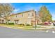 Well-maintained two-story townhome with an attached garage, and manicured lawn at 1518 Orrington Payne Pl, Casselberry, FL 32707