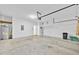Spacious garage features high ceilings for ample storage at 1518 Orrington Payne Pl, Casselberry, FL 32707