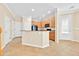 Eat-in kitchen features wood cabinets, granite counters, black appliances and tile flooring at 1518 Orrington Payne Pl, Casselberry, FL 32707
