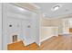 Upstairs laundry room featuring wood floors and a folding shelf at 1518 Orrington Payne Pl, Casselberry, FL 32707