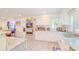 Featuring stainless steel appliances, a built in oven, lots of storage and quartz countertops at 15345 Rockridge Rd, Polk City, FL 33868