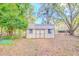 Storage building with double doors; a versatile space for tools, hobbies, or additional storage at 15345 Rockridge Rd, Polk City, FL 33868