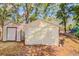 Exterior view of multiple storage sheds, providing ample storage on the property at 15345 Rockridge Rd, Polk City, FL 33868