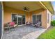 Spacious covered patio with brick pavers and comfortable seating, perfect for outdoor relaxation and entertaining at 159 Ventana Dr, Kissimmee, FL 34759