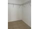 Walk-in closet with wire shelving and tile flooring at 2408 Cedarfield Ln, Kissimmee, FL 34744