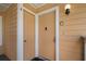 Inviting front entry of the condo with two doors for privacy and security features at 2466 Sweetwater Club Cir # 4, Kissimmee, FL 34746