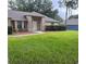 Charming brick home with a well-manicured lawn and inviting curb appeal at 3216 Fieldcrest Ter, Deltona, FL 32725