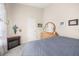 Neutral bedroom featuring carpet, an electric fireplace, and a wooden dresser at 336 California Blvd, Davenport, FL 33897