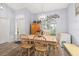 Bright dining area with wood-style flooring, archway, and modern chandelier at 336 California Blvd, Davenport, FL 33897