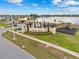 A well-kept Villa Mar community entrance sign with a playground and lakeside view at 3930 Palazzo Pl, Winter Haven, FL 33884