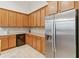 Kitchen featuring stainless steel appliances, granite countertops, and ample cabinet space at 4911 Drawdy Ct, St Cloud, FL 34772