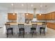 Kitchen island with granite countertop and stylish seating at 4911 Drawdy Ct, St Cloud, FL 34772