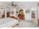 Main bedroom with a view into an organized walk-in closet at 4911 Drawdy Ct, St Cloud, FL 34772