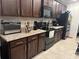 Kitchen with granite countertops and stainless steel appliances at 499 Meadow Pointe Dr, Haines City, FL 33844