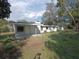 A home with a large grassy backyard at 5804 Viking Rd, Orlando, FL 32808