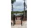 Community deck overlooking a serene lake, perfect for relaxing at 6013 Westgate Dr # 2421, Orlando, FL 32835