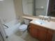 Bright bathroom featuring a white sink and shower-bathtub combo at 6028 Westgate Dr # 104, Orlando, FL 32835